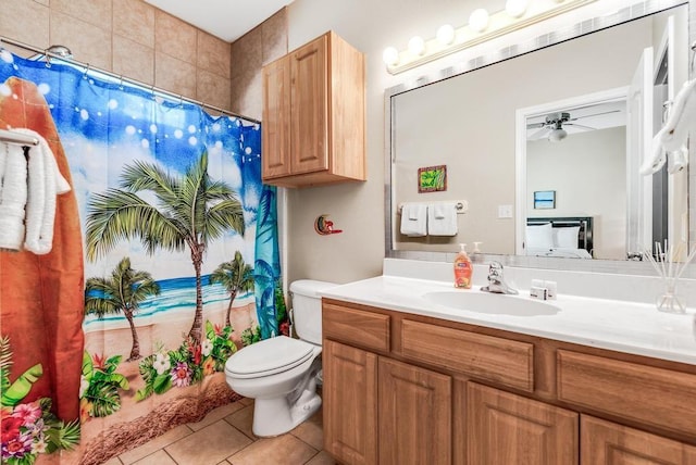 full bathroom with a ceiling fan, toilet, a shower with curtain, tile patterned floors, and vanity