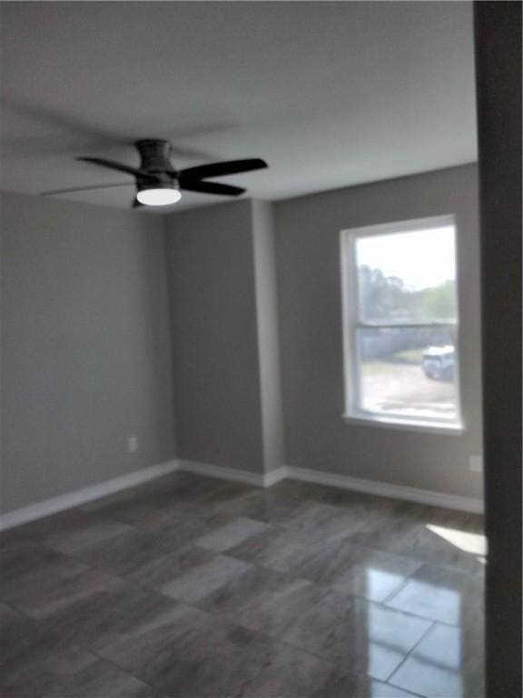 3018 Greenwood Dr, Corpus Christi, TX 78405 - spare room with baseboards and ceiling fan
