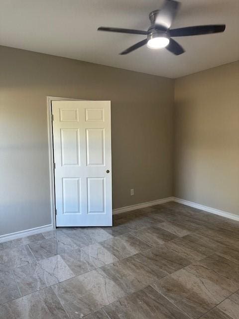 3018 Greenwood Dr, Corpus Christi, TX 78405 - spare room featuring baseboards and a ceiling fan
