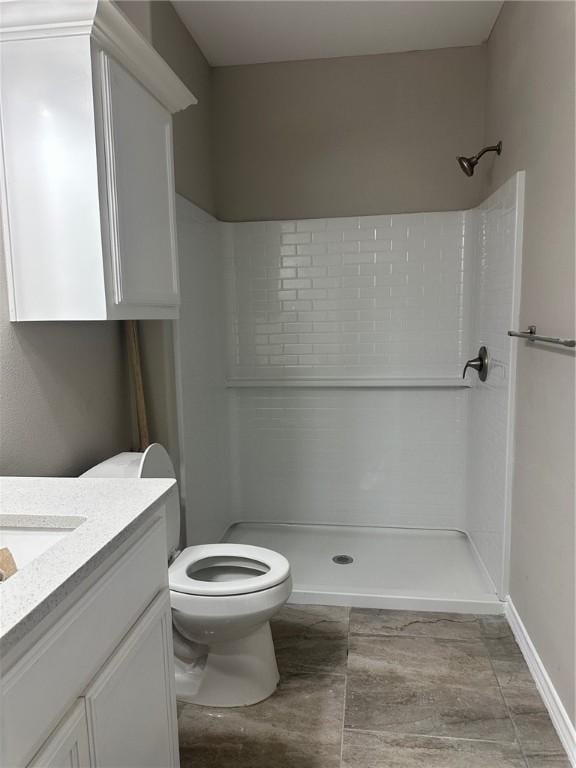 3018 Greenwood Dr, Corpus Christi, TX 78405 - full bath featuring a shower stall, toilet, and vanity