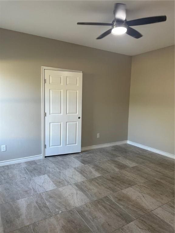 3018 Greenwood Dr, Corpus Christi, TX 78405 - empty room with baseboards and ceiling fan