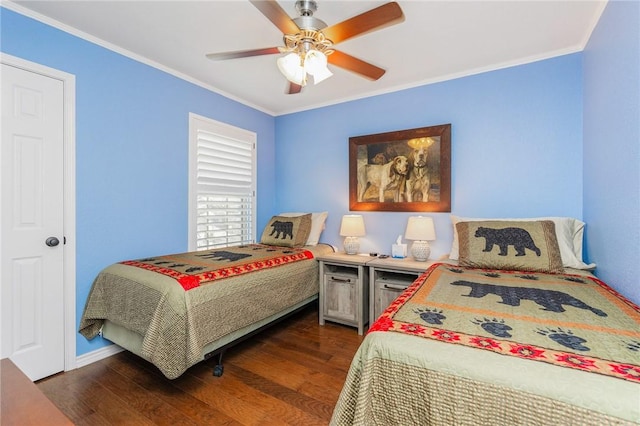 bedroom featuring ceiling fan, dark wood finished floors, and crown molding