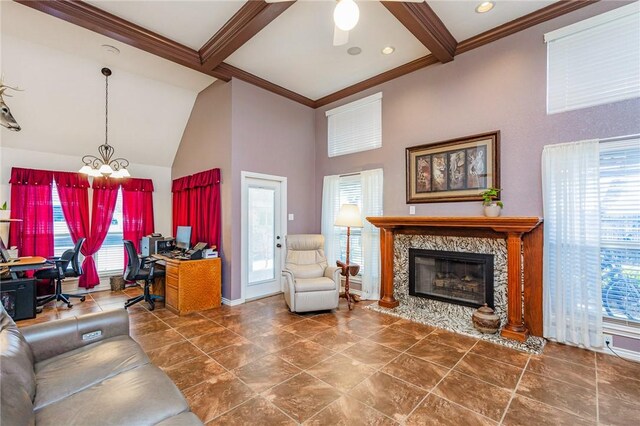 living area featuring high vaulted ceiling, beam ceiling, and a healthy amount of sunlight