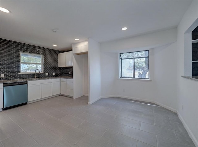 4802 Eider Dr, Corpus Christi, TX 78413 - kitchen featuring dishwasher, plenty of natural light, decorative backsplash, white cabinetry, and recessed lighting