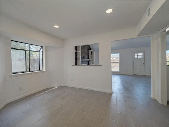 4802 Eider Dr, Corpus Christi, TX 78413 - spare room featuring recessed lighting and baseboards