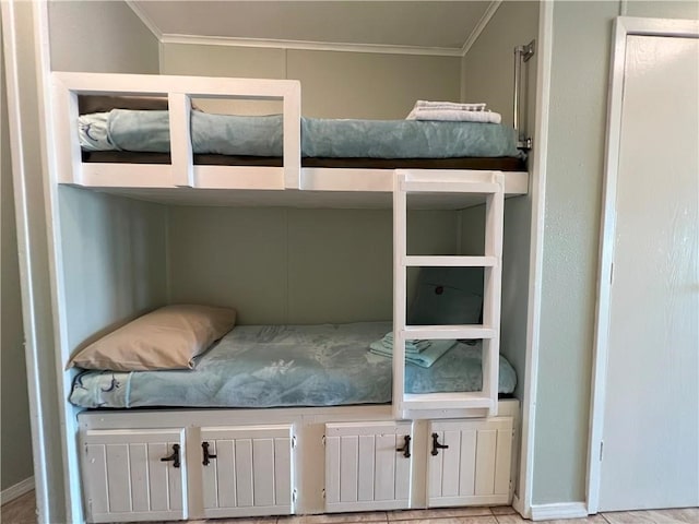 bedroom with radiator heating unit and crown molding