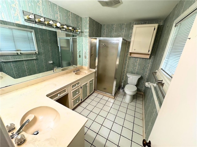 bathroom with vanity, an enclosed shower, tile patterned floors, and toilet