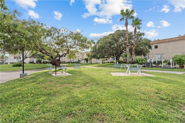 14300 S Padre Island Dr S Unit 220C, Corpus Christi, TX 78418 - surrounding community with a lawn