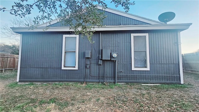 view of property exterior with fence