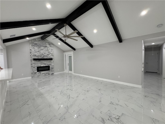 unfurnished living room with lofted ceiling with beams, ceiling fan, and a fireplace