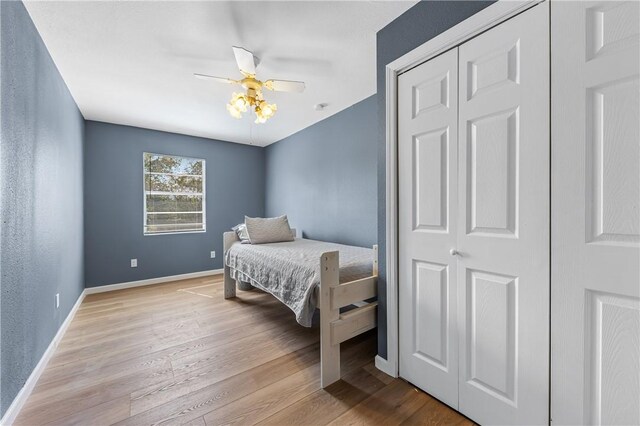 3609 Stinson St, Corpus Christi, TX 78405 - bedroom with wood finished floors, baseboards, ceiling fan, and a closet