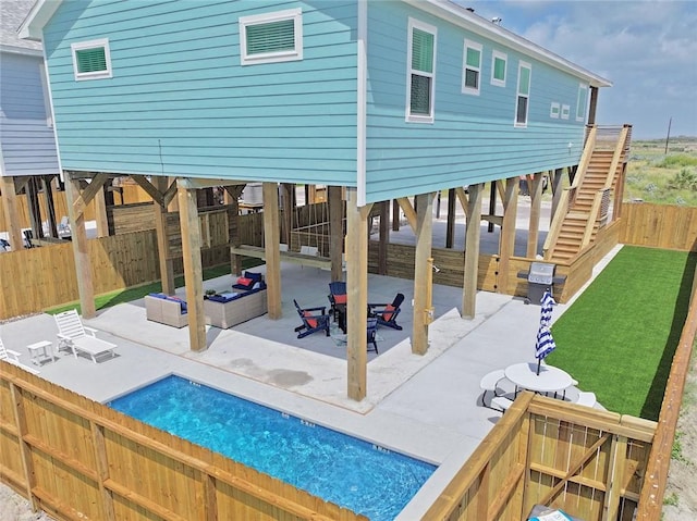1901 Eskridge Rd, Port Aransas, TX 78373 - rear view of house with a patio area and a fenced backyard