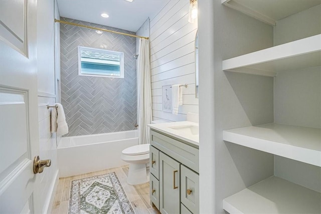 1901 Eskridge Rd, Port Aransas, TX 78373 - bathroom featuring shower / tub combo with curtain, toilet, vanity, and wood finished floors