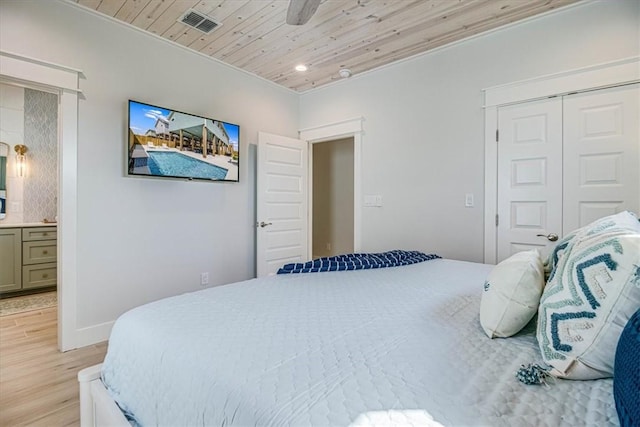 1901 Eskridge Rd, Port Aransas, TX 78373 - bedroom featuring light wood-type flooring, wooden ceiling, a ceiling fan, a closet, and recessed lighting