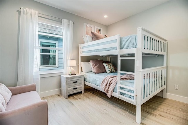 1901 Eskridge Rd, Port Aransas, TX 78373 - bedroom with baseboards, light wood-type flooring, and recessed lighting