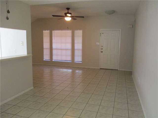 tiled empty room with ceiling fan