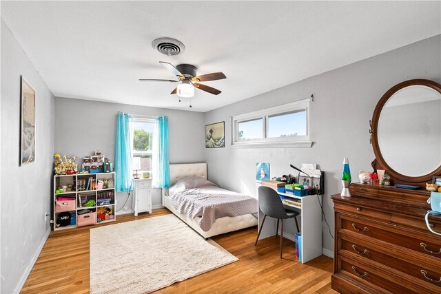 5830 Woodhaven Dr, Corpus Christi, TX 78412 - bedroom featuring light wood finished floors and ceiling fan