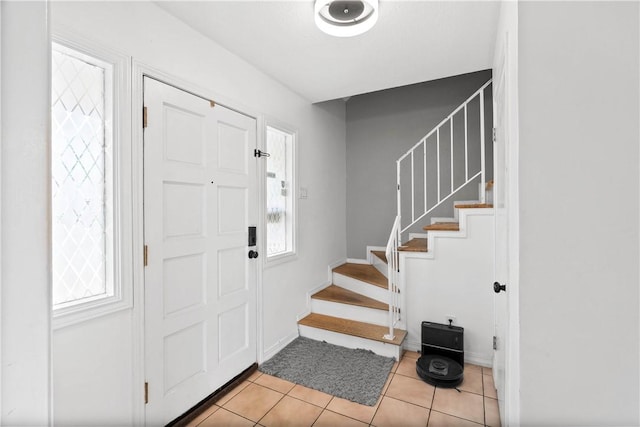 5830 Woodhaven Dr, Corpus Christi, TX 78412 - foyer featuring plenty of natural light, stairs, and light tile patterned flooring