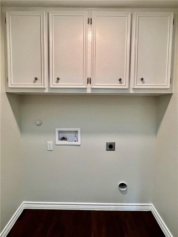 laundry room with hookup for a washing machine, electric dryer hookup, hookup for a gas dryer, and hardwood / wood-style flooring