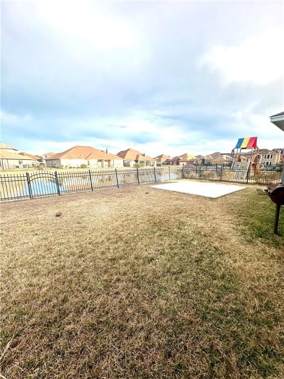 view of yard with a playground and a patio