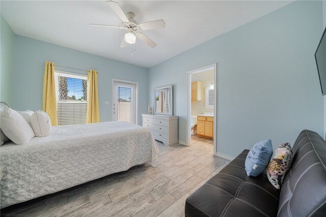 bedroom with connected bathroom, light wood-type flooring, and ceiling fan