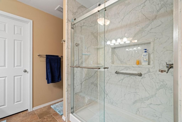 bathroom with an enclosed shower