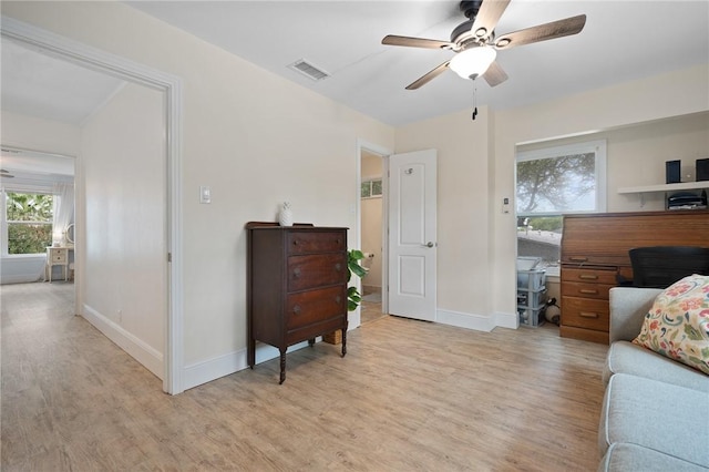 interior space featuring ceiling fan and light hardwood / wood-style flooring