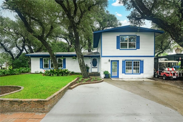 view of front of home with a front yard