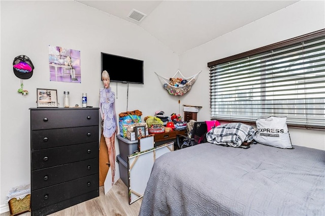 1517 Dorado St, Corpus Christi, TX 78417 - bedroom with lofted ceiling and wood finished floors