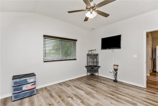 1517 Dorado St, Corpus Christi, TX 78417 - unfurnished living room featuring light wood-type flooring, a ceiling fan, and vaulted ceiling