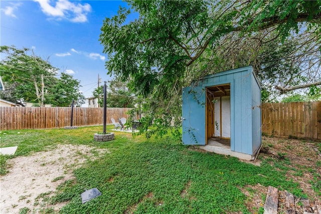 1517 Dorado St, Corpus Christi, TX 78417 - fenced backyard featuring a storage shed