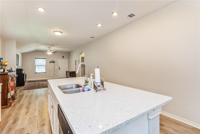 1517 Dorado St, Corpus Christi, TX 78417 - kitchen featuring light wood-style flooring, dishwasher, a ceiling fan, white cabinetry, and arched walkways