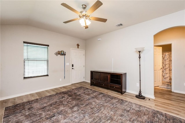 1517 Dorado St, Corpus Christi, TX 78417 - foyer entrance with wood finished floors, arched walkways, ceiling fan, and lofted ceiling
