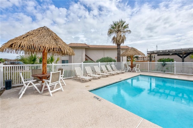 view of pool featuring a pergola and a patio area