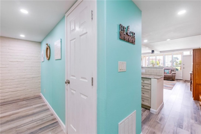 hall featuring light hardwood / wood-style flooring