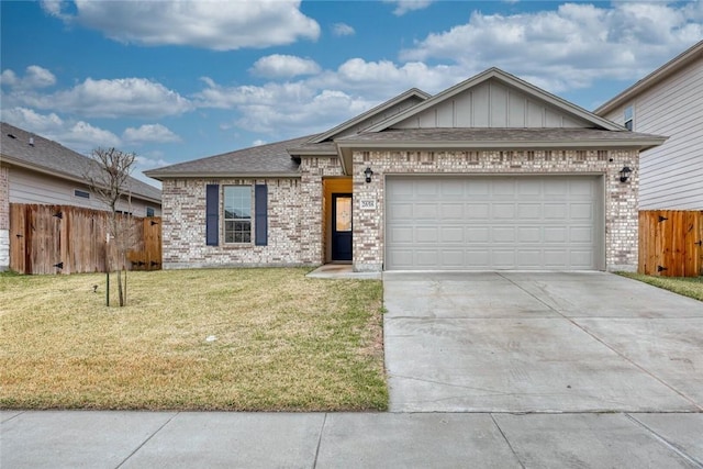 view of front facade featuring a garage and a front lawn