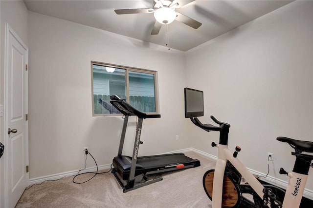 workout area featuring carpet floors and ceiling fan