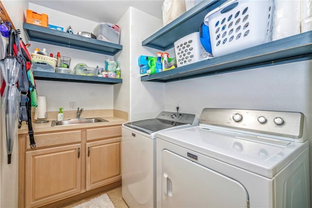 7410 Lake Micala Dr, Corpus Christi, TX 78413 - laundry area with washing machine and dryer, cabinet space, and light tile patterned floors