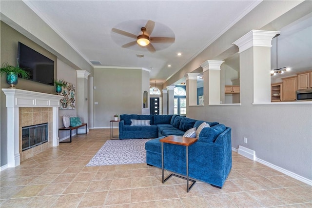 7410 Lake Micala Dr, Corpus Christi, TX 78413 - living area with ceiling fan, crown molding, a tile fireplace, and light tile patterned flooring
