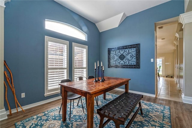 7410 Lake Micala Dr, Corpus Christi, TX 78413 - dining area featuring wood finished floors and lofted ceiling