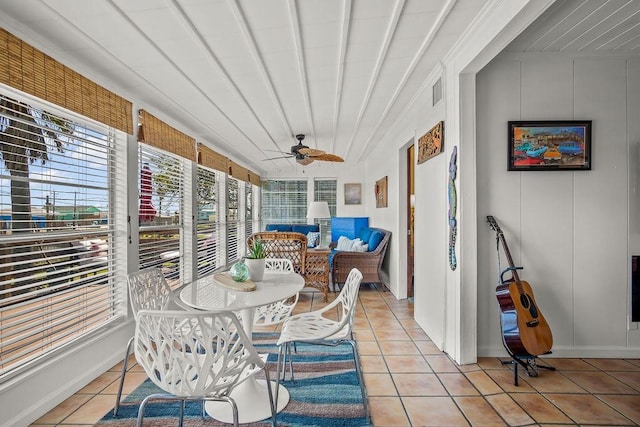 sunroom / solarium with ceiling fan