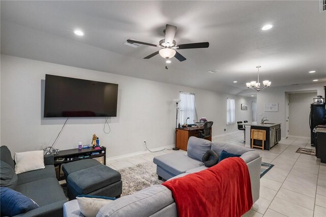7606 Herd Rider, Corpus Christi, TX 78414 - living room featuring light tile patterned floors, a chandelier, recessed lighting, ceiling fan, and baseboards
