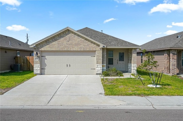 7606 Herd Rider, Corpus Christi, TX 78414 - view of front facade featuring brick siding, a garage, driveway, and a shingled roof