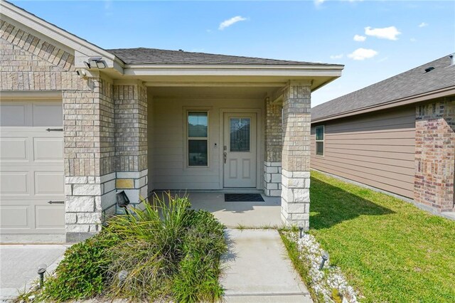 7606 Herd Rider, Corpus Christi, TX 78414 - property entrance featuring a garage and stone siding