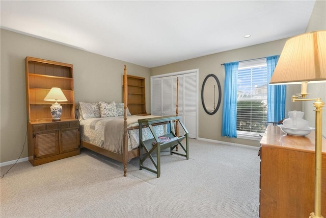 bedroom featuring light colored carpet