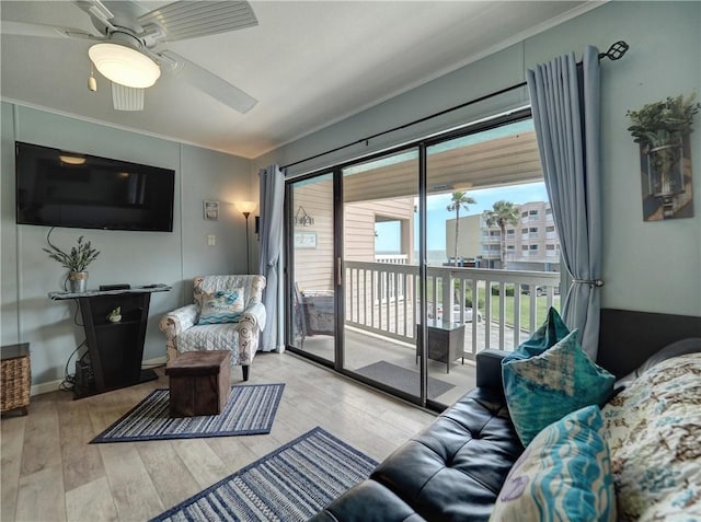 3938 Surfside Blvd Unit 3124, Corpus Christi, TX 78402 - living area featuring wood finished floors, ceiling fan, and ornamental molding