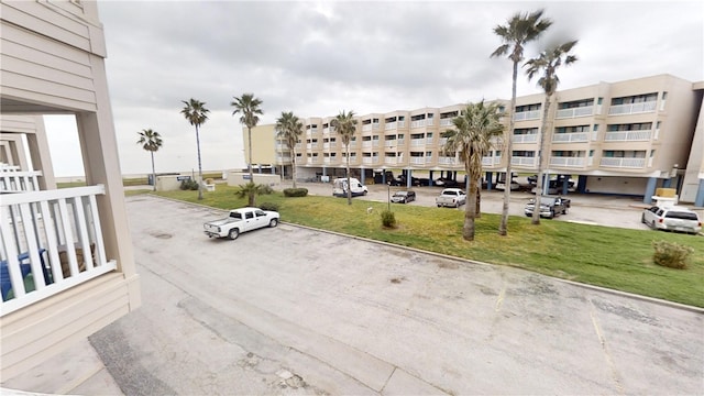 3938 Surfside Blvd Unit 3124, Corpus Christi, TX 78402 - view of apartment building / complex featuring uncovered parking