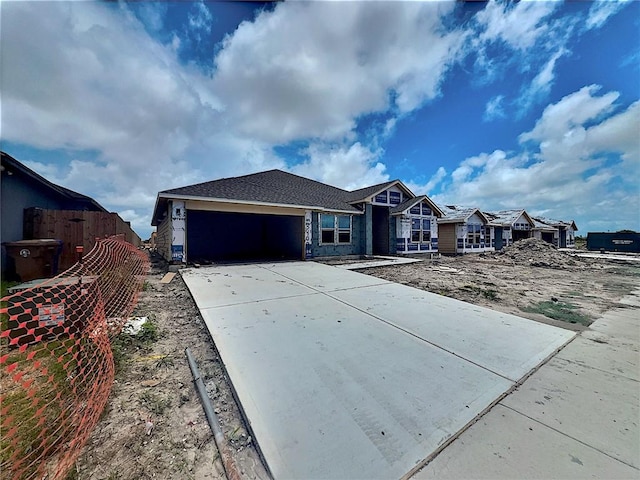 3409 Median Dr, Corpus Christi, TX 78414 - view of front of house featuring a garage and driveway
