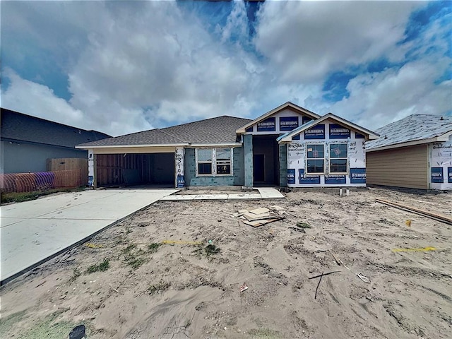 3409 Median Dr, Corpus Christi, TX 78414 - unfinished property featuring an attached garage and concrete driveway