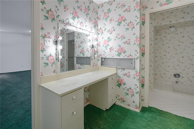 1405 Omohundro St, Rockport, TX 78382 - bathroom featuring wallpapered walls, vanity, and tile patterned flooring